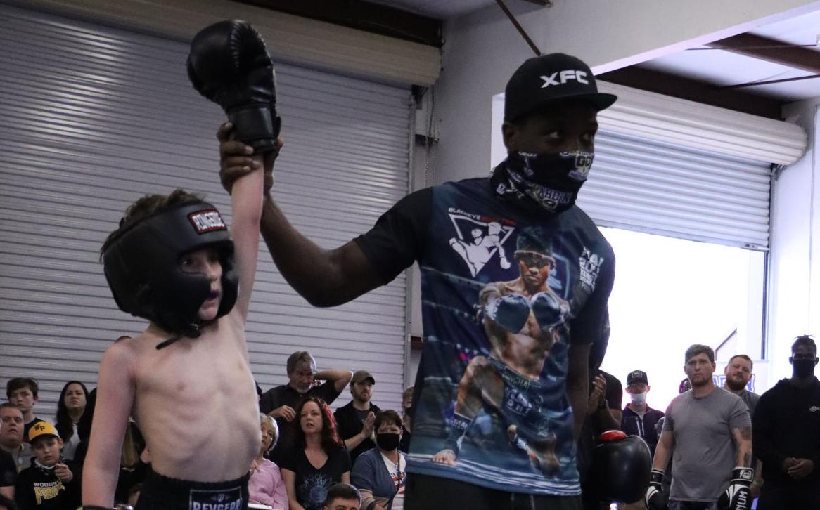 Moss wins first kickboxing fight